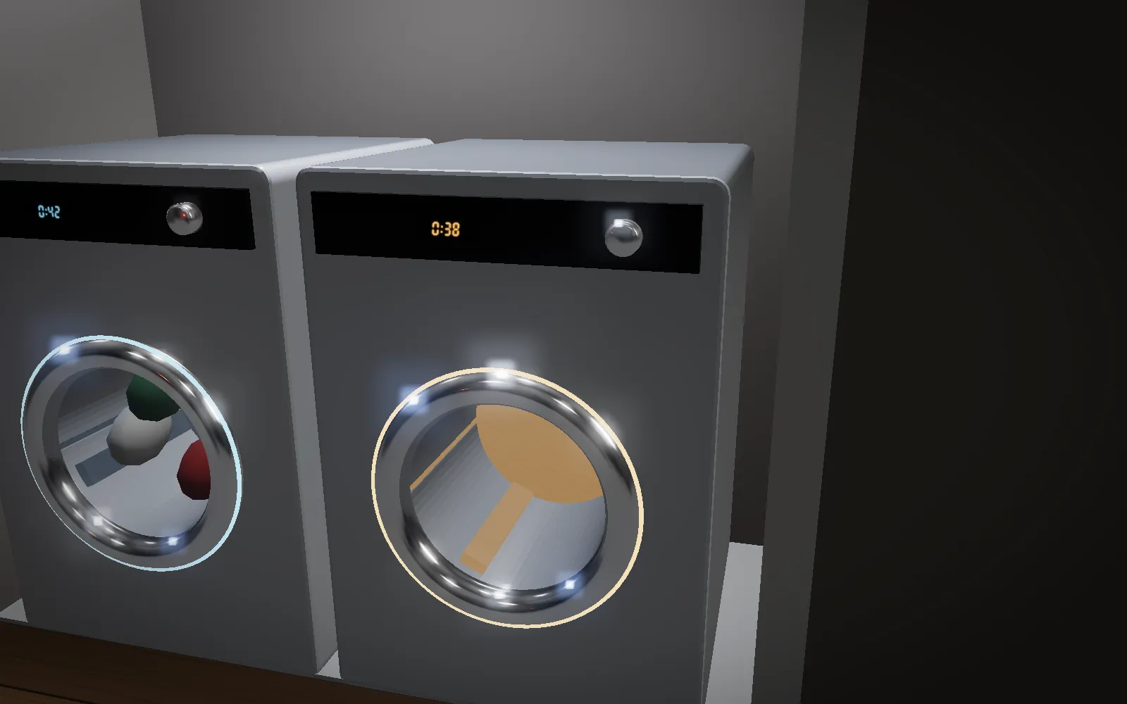 A front-load dryer glowing warm inside beside the washer